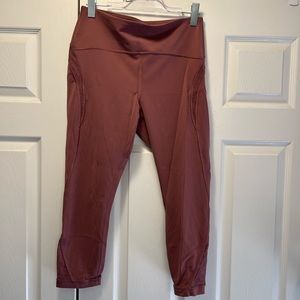 Lululemon dusty pink wunder under leggings with lace cutouts